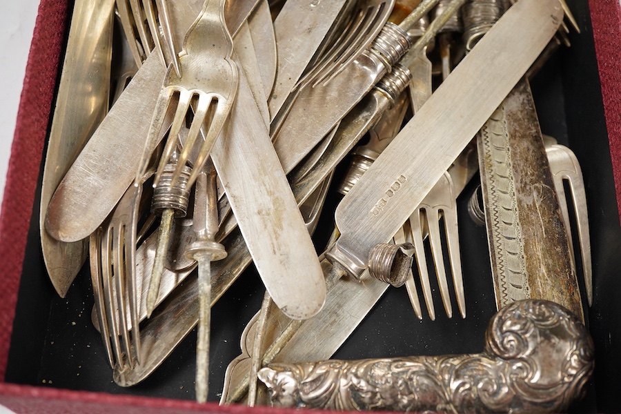 Eleven silver fish knife blades and eleven silver fork tines, by Walker & Hall, Sheffield, 1927 and 1933, eleven Victorian silver dessert knife blades and ten dessert fork tines, James Dixon & Sons, Sheffield, 1897, gros